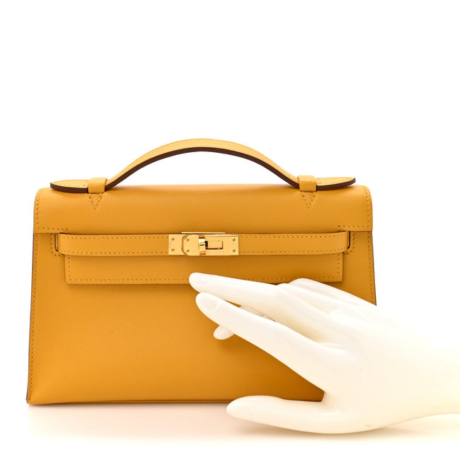 Swift Kelly Pochette Clutch Jaune Ambre Main Image