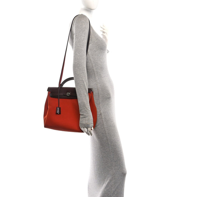 Military Toile Vache Hunter Tri-Color Herbag Zip Retourne 31 PM Rouge H Cuirve Orange Mecano Main Image