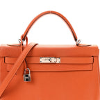 Togo Kelly Retourne 32 Orange