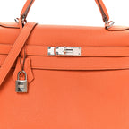 Togo Kelly Retourne 32 Orange