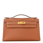 Swift Kelly Pochette Clutch Gold