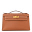 Swift Kelly Pochette Clutch Gold
