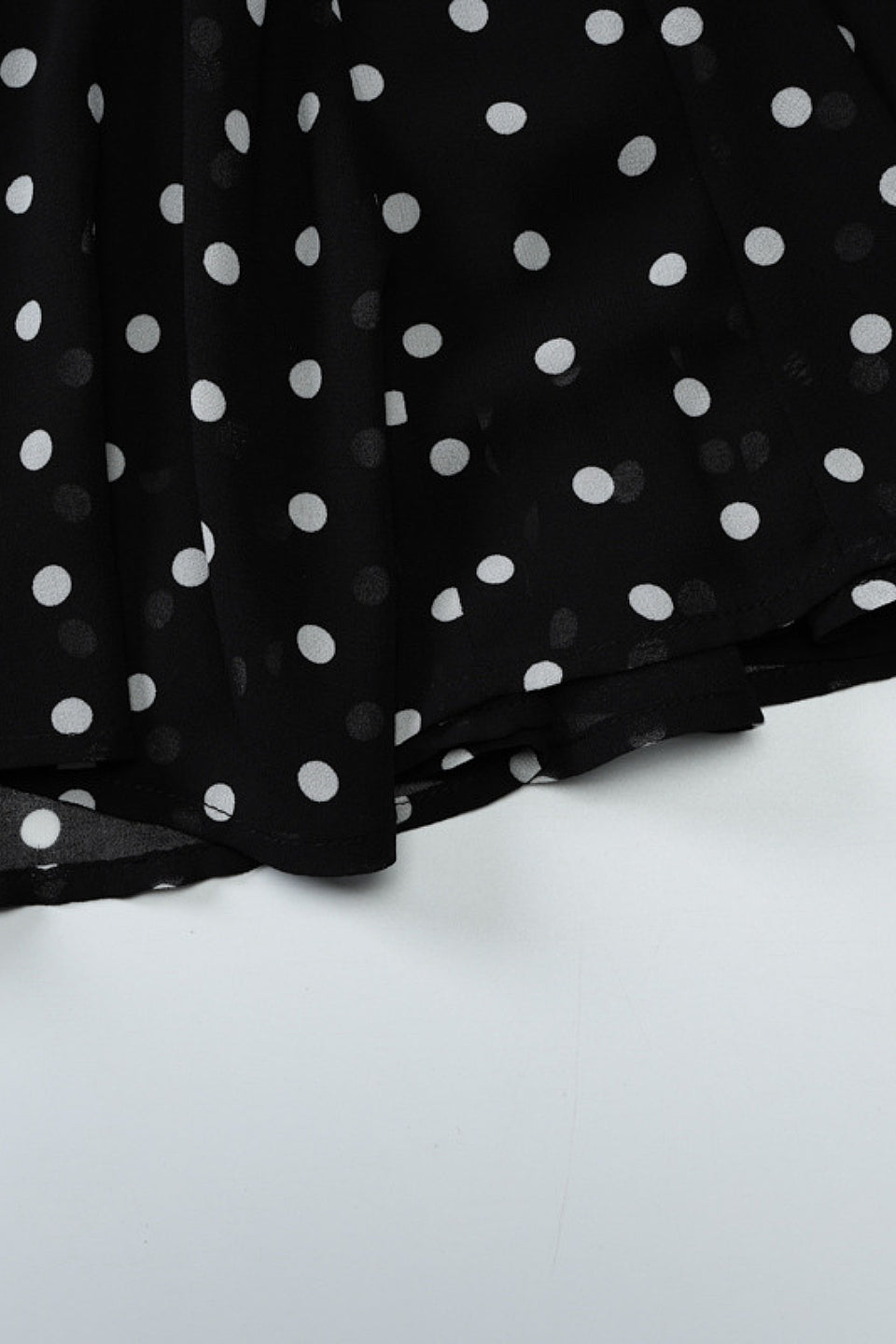 Noir Dot Halter Ruffle Mini Dress