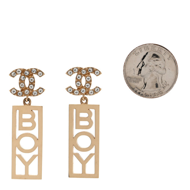 Metal Crystal CC Boy Drop Earrings Gold Main Image
